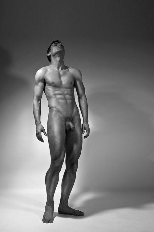 Black man posing naked