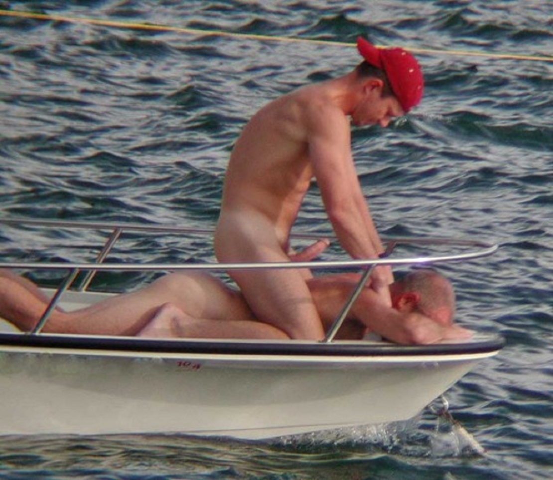 Naked men boating