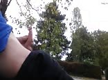 Teen jerking in public park