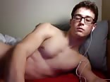 Horny geek boy webcam wank in bed cums on himself