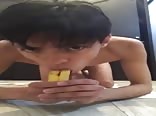 Cute twink porn plays with a banana.