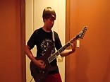 Young twink playing guitar