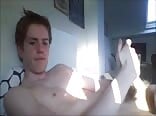 Bedroom boy porn cranks out a nice load of jizz