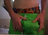 Boy porn in green shorts jerks and cums