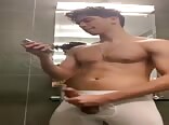 Shorting a creamy load of cum in the gym bathroom boys porn