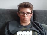 Cute twink porn in glasses unloads after unbuckling his jeans